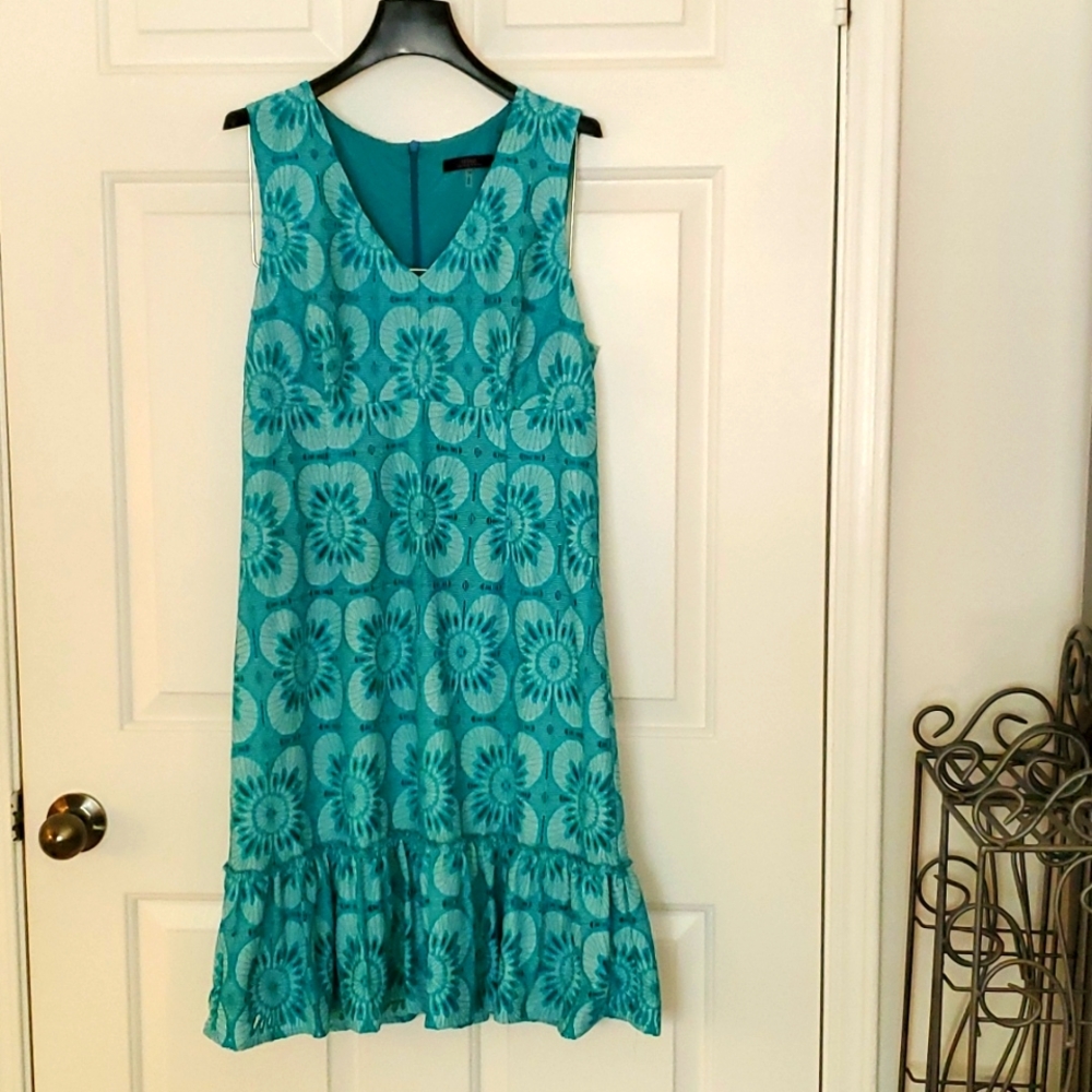 Turquoise sleeveless brocade party dress Size 10 by Trina.